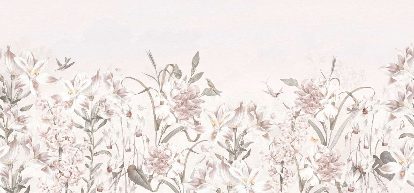 Sanftes Blumenfeld mit Kolibris.